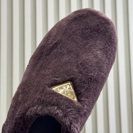 PRADA 25S CLOGS IN WINE RED SHEARLING