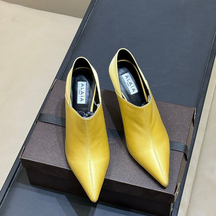 ALAIA 26S TRANSPARENT HIGH HEELS IN YELLOW SATIN