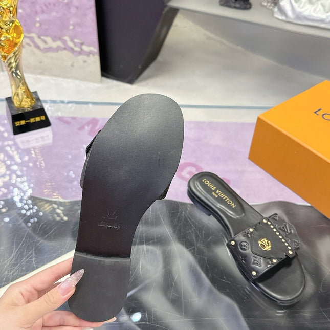 LV 26S FLAT SLIDE SANDALS IN BLACK EMBOSSED CALFSKIN GOLD HARDWARE