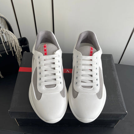 PRADA 26S AMERICA CUP SNEAKERS IN WHITE SOFT RUBBER AND BIKE FABRIC