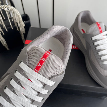 PRADA 26S AMERICA CUP SNEAKERS IN COOL GRAY SOFT RUBBER AND BIKE FABRIC