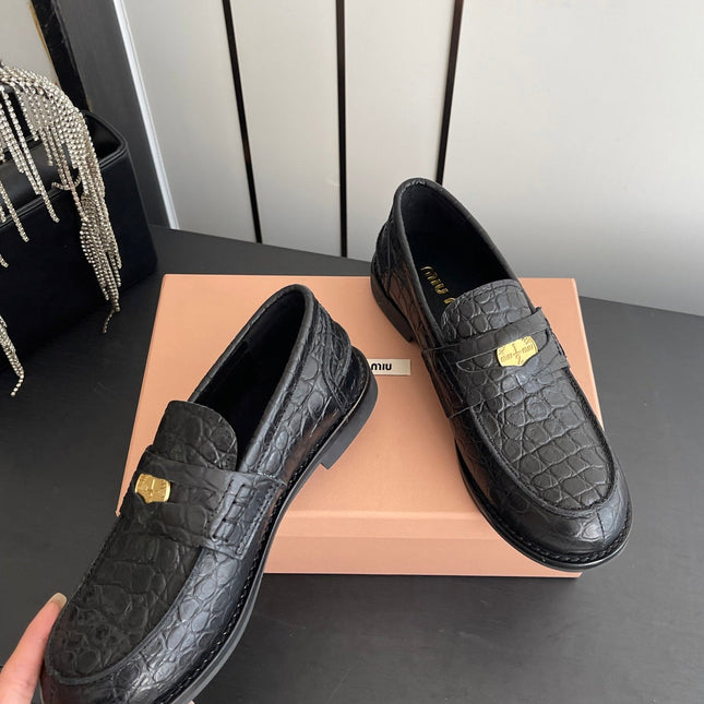 MIUMIU 26S PENNY LOAFERS IN BLACK CALFSKIN CROCODILE EMBOSSING