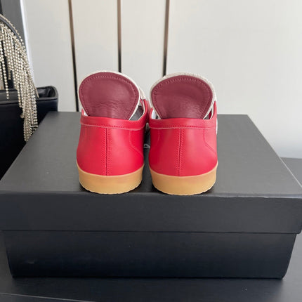 CHANEL LOW-TOP SNEAKERS IN RED CALFSKIN MIX SUEDE