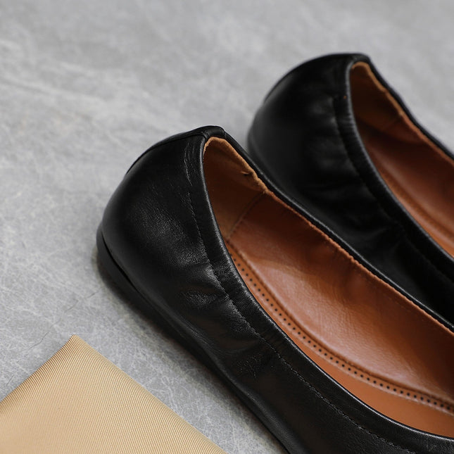 ALAIA BALLET FLATS IN BLACK SMOOTH CALFSKIN