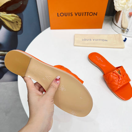 LV 26S MARE FLAT MULES IN ORANGE CALFSKIN