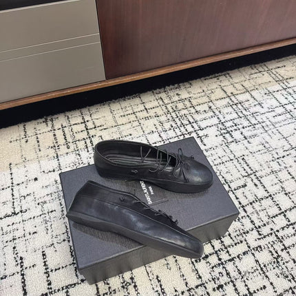 MIUMIU 26S LACE UP BOW LOAFERS IN BLACK CALFSKIN