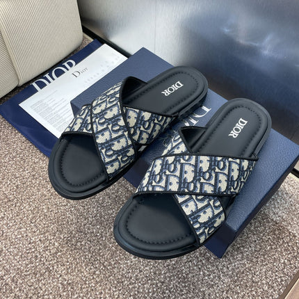 DIOR 25S ALIAS CROSS-STRAP SLIDES IN BLACK CALFSKIN WITH CD OBLIQUE DEEP BLUE LOGO