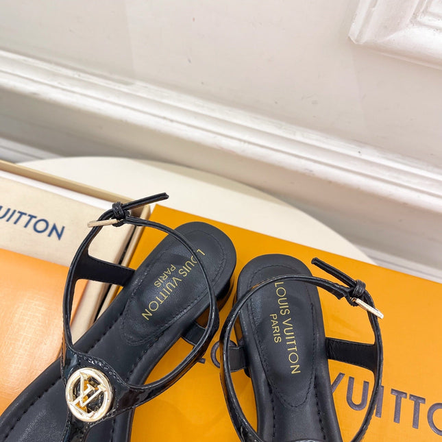 LV SUNKISS T-STRAP SANDALS IN BLACK CALFSKIN GOLD-TONE ACCESSORY.