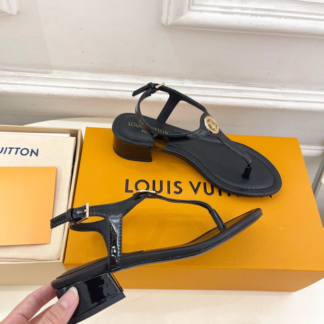 LV SUNKISS T-STRAP SANDALS IN BLACK CALFSKIN GOLD-TONE ACCESSORY.