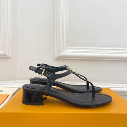 LV SUNKISS T-STRAP SANDALS IN BLACK CALFSKIN GOLD-TONE ACCESSORY.